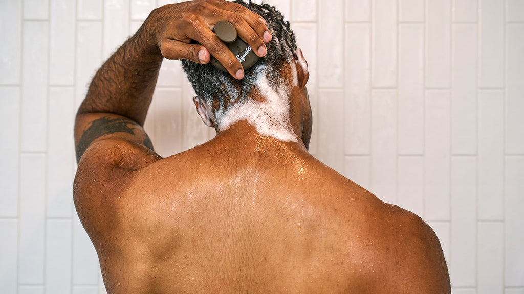 Dr. Squatch Coconut Castaway Shampoo being used