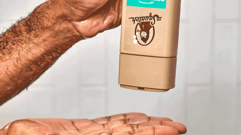 Dr. Squatch Coconut Castaway Shampoo being used