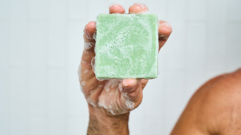 Dr. Squatch Green Tea Butter bar soap being used