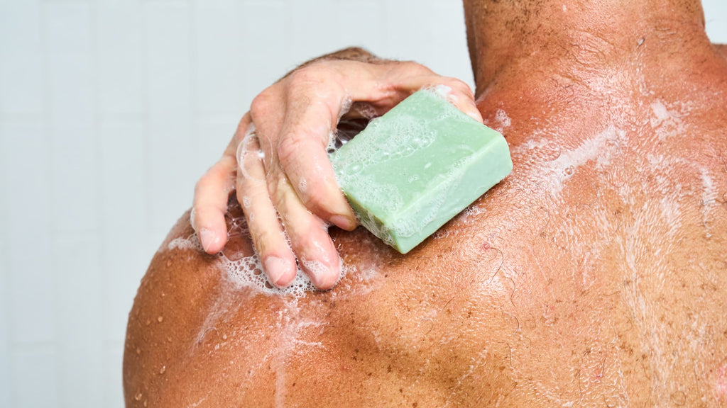 Dr. Squatch Green Tea Butter bar soap being used