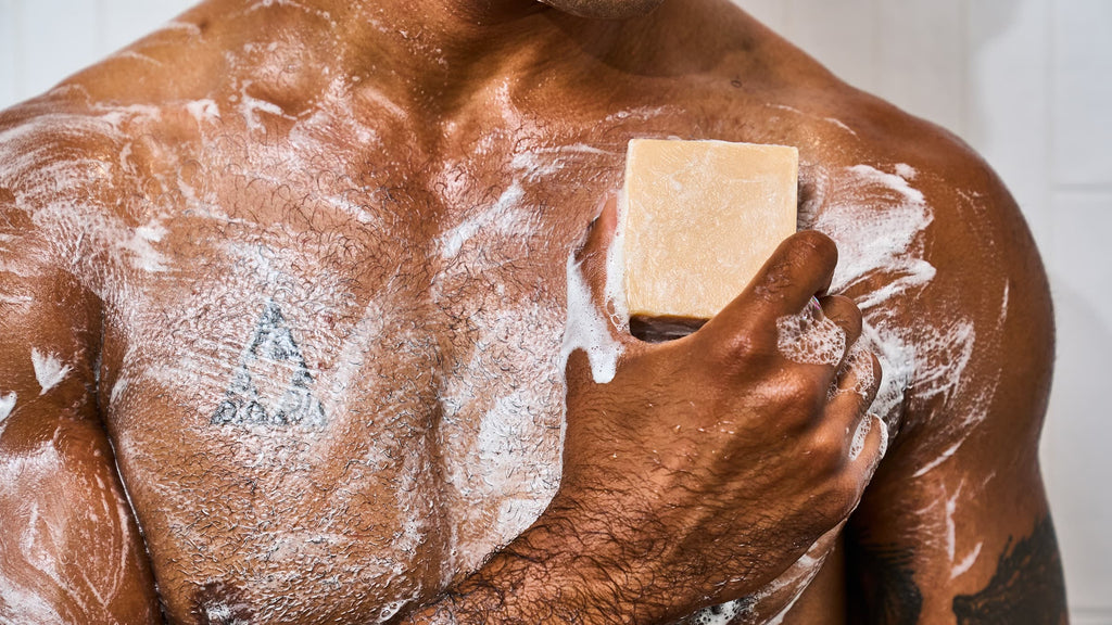 Dr. Squatch Mango Butter bar soap being used